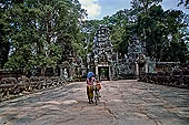 Preah Khan temple - west entrance of the fourth enclosure, the bridge lined by devas and asuras.